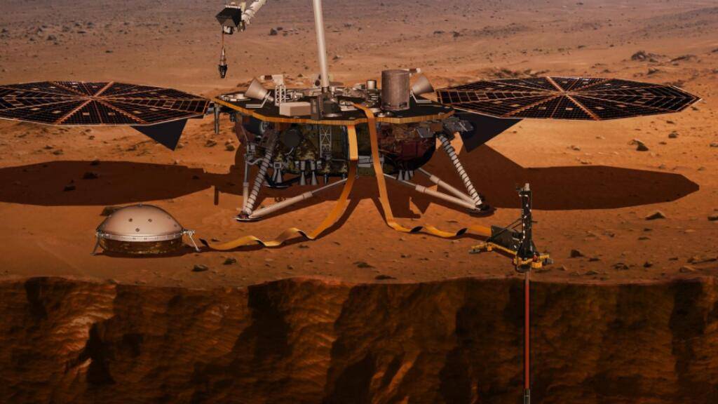 Die Nasa-Sonde InSight auf der Marsoberfläche. Der Bohrer im Bild rechts hat nun endgültig versagt, weil die Bodenbeschaffenheit problematischer ist als angenommen. (Pressebild DLR)
