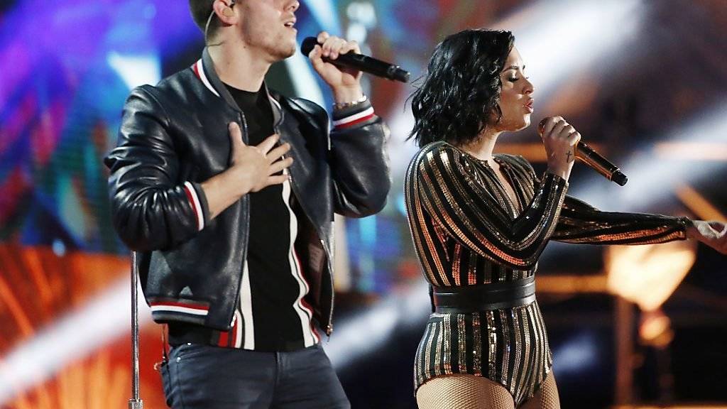 Nick Jonas und Demi Lovato luden «Pulse»-Mitarbeiter zu einem Konzert ein. (Archivbild)