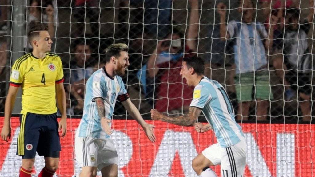 Lionel Messi (links) und Angel Di Maria bejubeln Argentiniens dritten Treffer