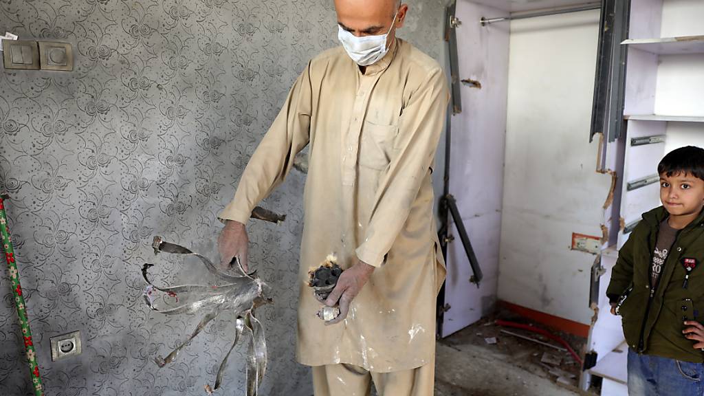 Beim Einschlag zahlreicher Mörsergranaten in Kabul sind mindestens acht Menschen getötet worden. Foto: Rahmat Gul/AP/dpa