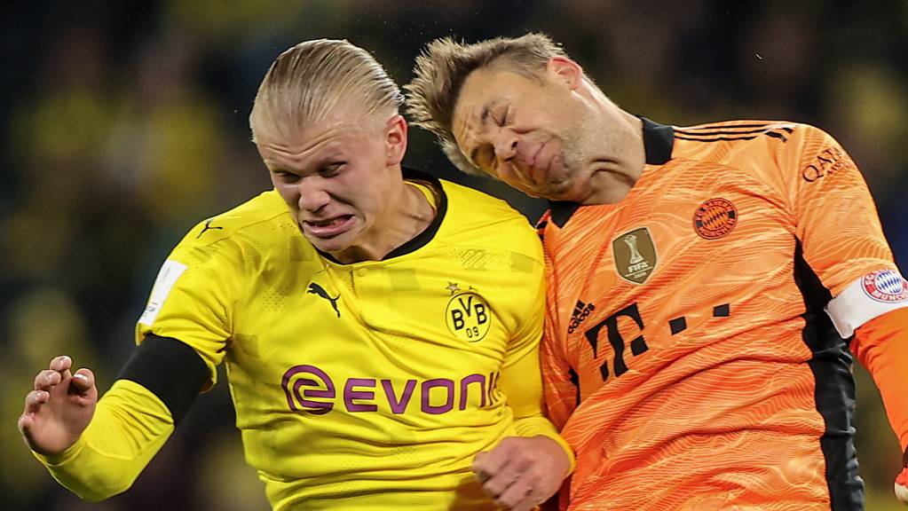Harter Kampf auch im Supercup: Dortmunds Goalgetter Erling Haaland (links) gegen Goalie Manuel Neuer