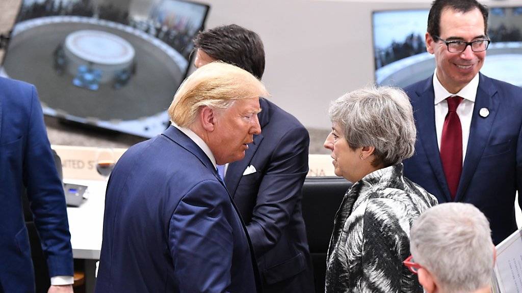 US-Präsident Donald Trump und die britische Premierministerin Theresa May am G20-Gipfel im japanischen Osaka. (Archivbild)