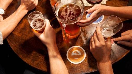 people drinking beer, shot from overhead