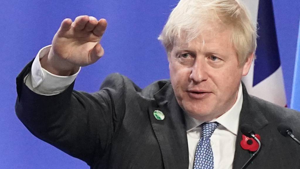 ARCHIV - Der britische Premierminister Boris Johnson hat zur Halbzeit der Weltklimakonferenz COP26 in Glasgow zu mehr Ehrgeiz bei den Verhandlungen aufgerufen. «Die COP26 hat noch eine Woche Zeit, um für die Welt zu liefern, wir müssen alle an einem Strang ziehen und die Ziellinie ansteuern». Foto: Stefan Rousseau/PA Wire/dpa