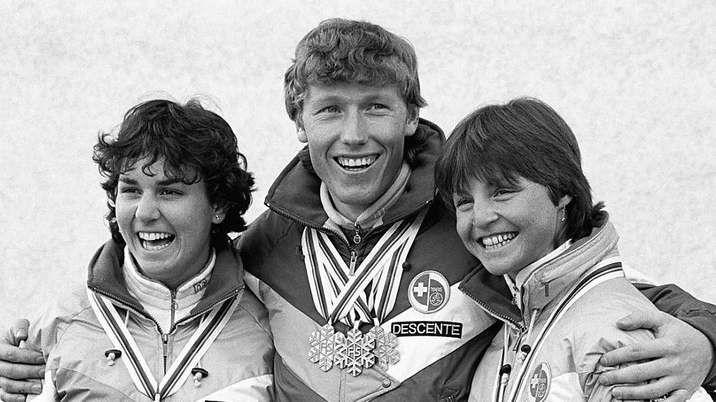 Schweizer Weltmeister-Trio in Bormio 1985: Michela Figini (links), Pirmin Zurbriggen, Erika Hess.