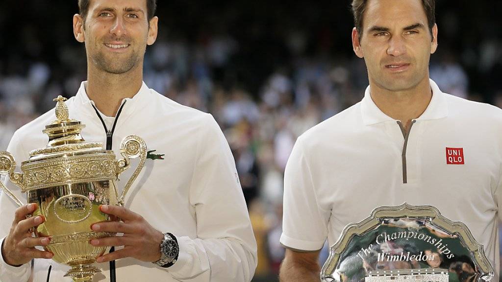 Roger Federer (rechts) und der Sieger Novak Djokovic lieferten sich einen epischen Wimbledon-Final