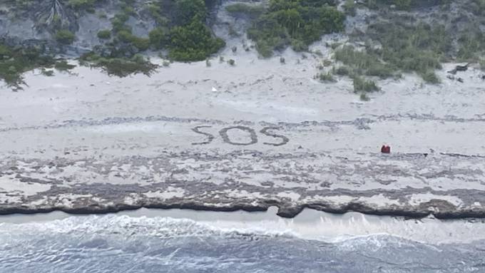 «SOS» im Sand: US-Küstenwache veröffentlicht Rettungsfoto