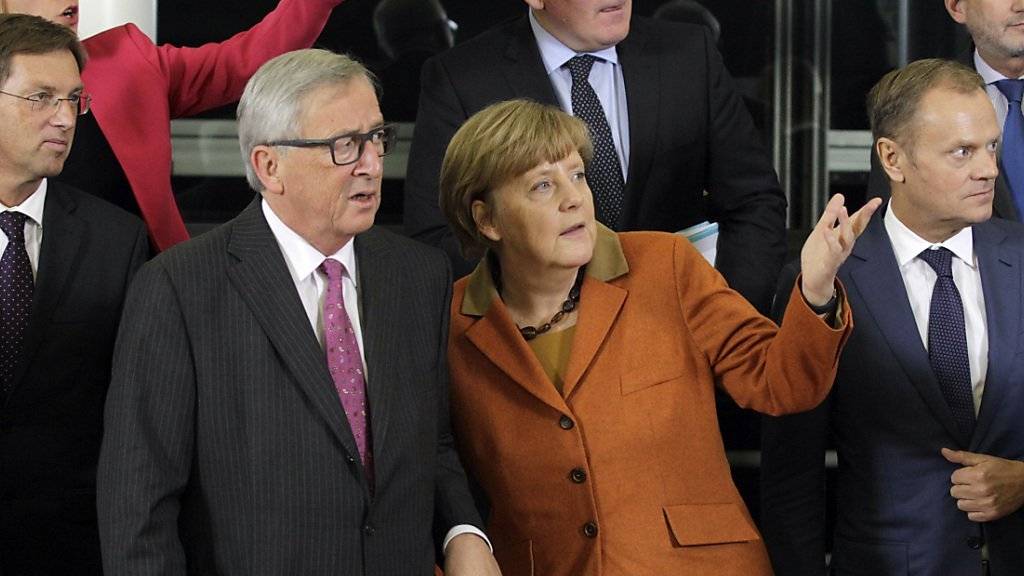 Die Gipfelteilnehmer, in der Mitte die deutsche Bundeskanzlerin Angela Merkel