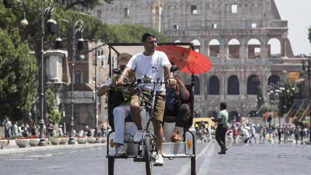 Rastlos in Rom: Das Geschäft mit Touristen in Italien brummt in diesem Sommer.