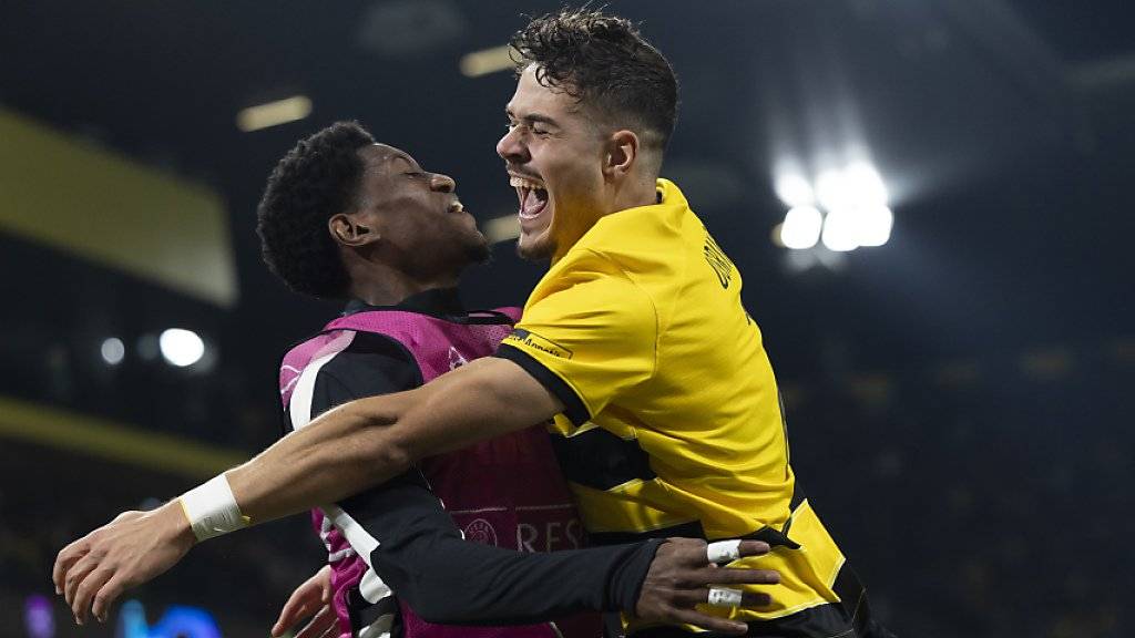 Filip Ugrinich celebrates a 3-0 victory with substitute Joel Monteiro.