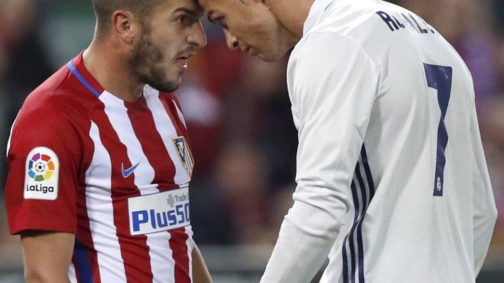 Cristiano Ronaldo (rechts) gewann das Kräftemessen mit Atleticos Koke