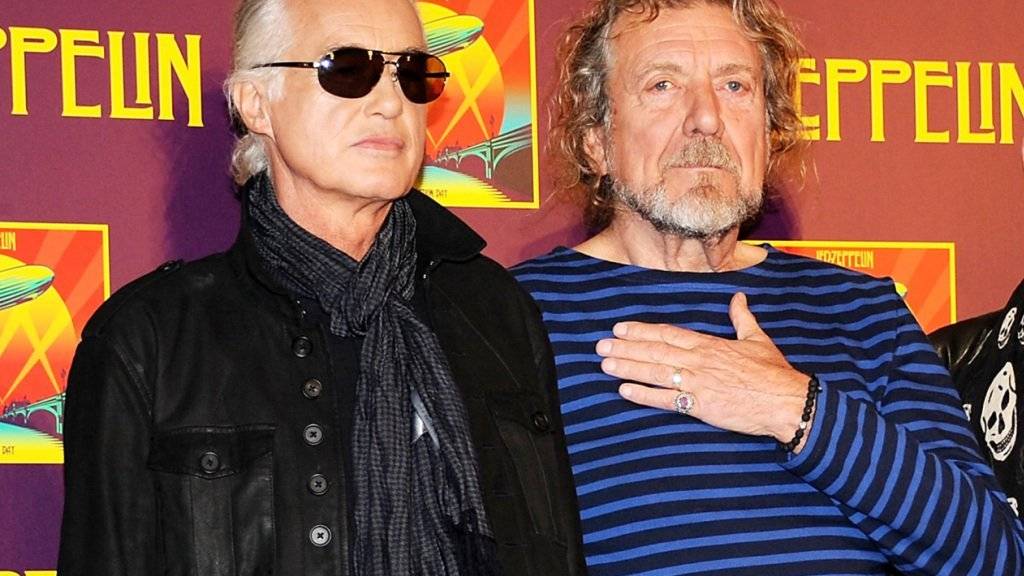 Mit «Stairway to Heaven» gelang Jimmy Page (links) und Robert Plant und ihrer Band Led Zeppelin ein Welthit. Nun müssen sich die beiden Musiker gegen Plagiatsvorwürfe wehren. (Archivbild)