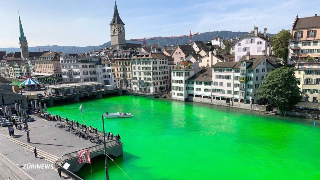 Klimaaktivisten färben Limmat grasgrün