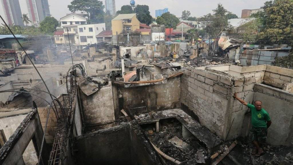 Spuren der Verwüstung nach dem Brand in Quezon City.