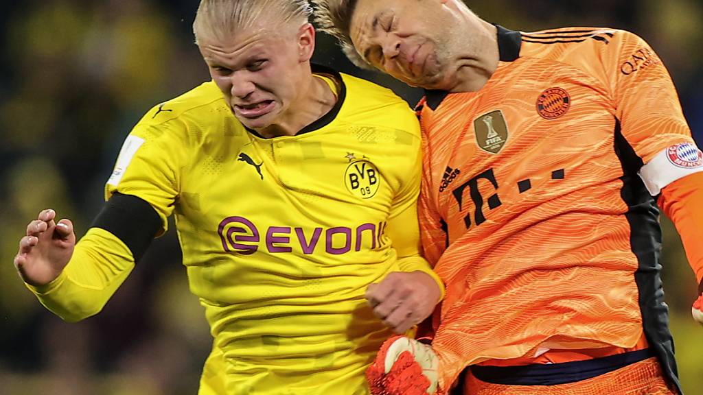 Harter Kampf auch im Supercup: Dortmunds Goalgetter Erling Haaland (links) gegen Goalie Manuel Neuer
