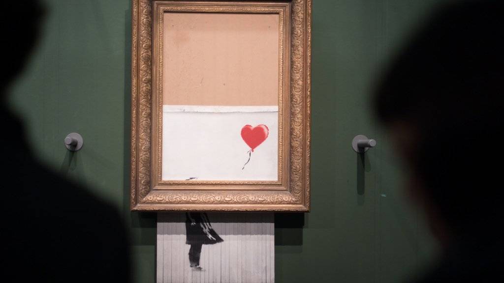 Banksy, der Marketingstratege: Indem der britische Street-Art-Künstler sein «Girl with Balloon» schredderte, schuf er mit «Love is in the Bin» ein neues Objekt der Begierde.