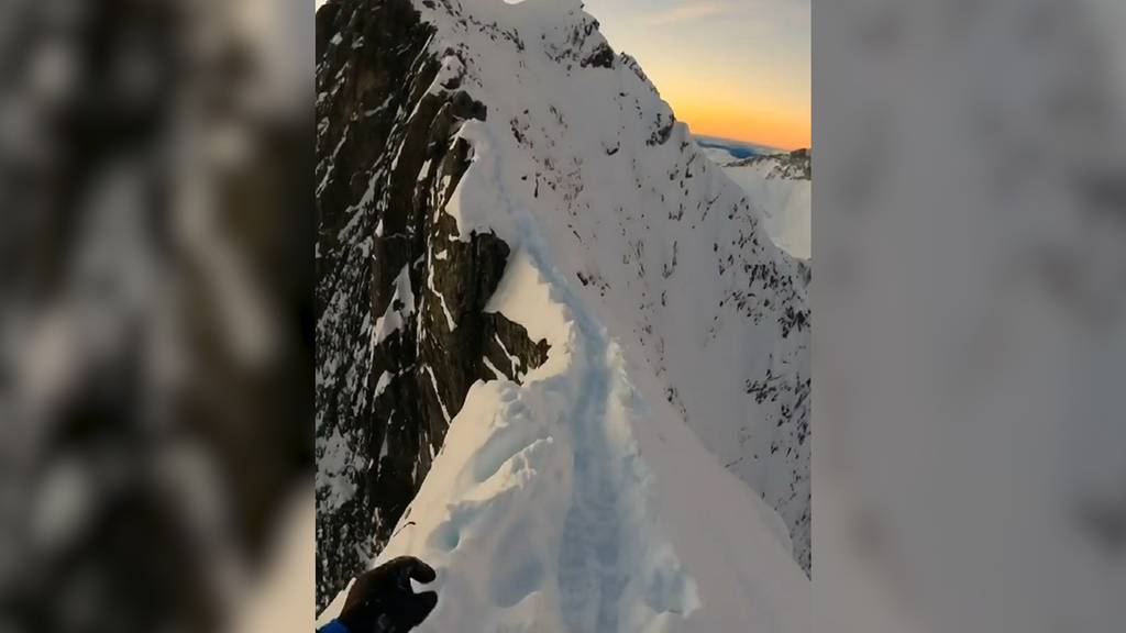 Dieser Bergsteiger rennt über eisigen Gipfelgrat
