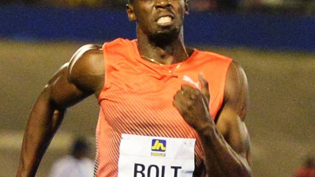 Usain Bolt muss auf die Zähne beissen, setzt sich aber klar durch