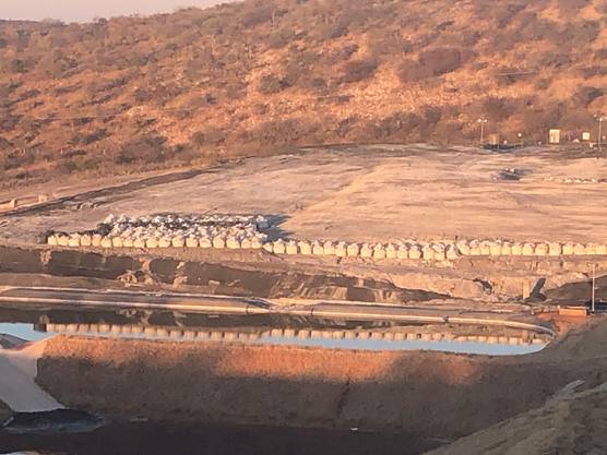 The controversial Tsumed smelter landfill.  The sacks contain waste from the production process contaminated with arsenic.