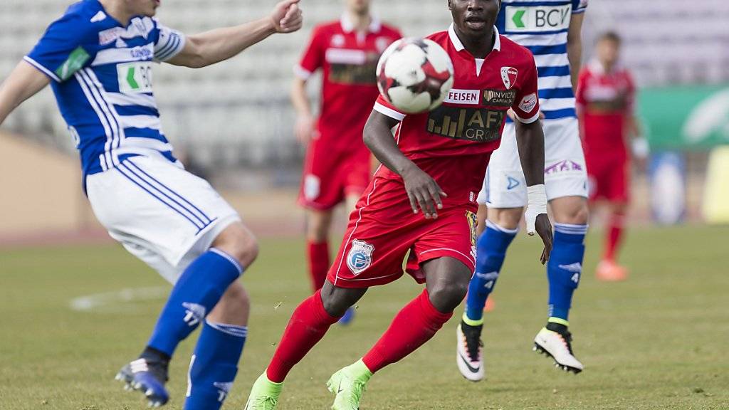 Der Sittener Chadrac Akolo (in rot) erzielte das einzige Goal in der Partie Lausanne - Sion