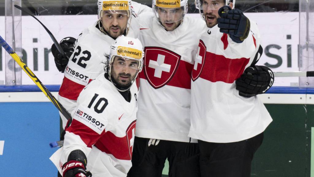 Die Schweiz kommt am zweiten Spieltag der WM zu einem knappen Sieg gegen Österreich