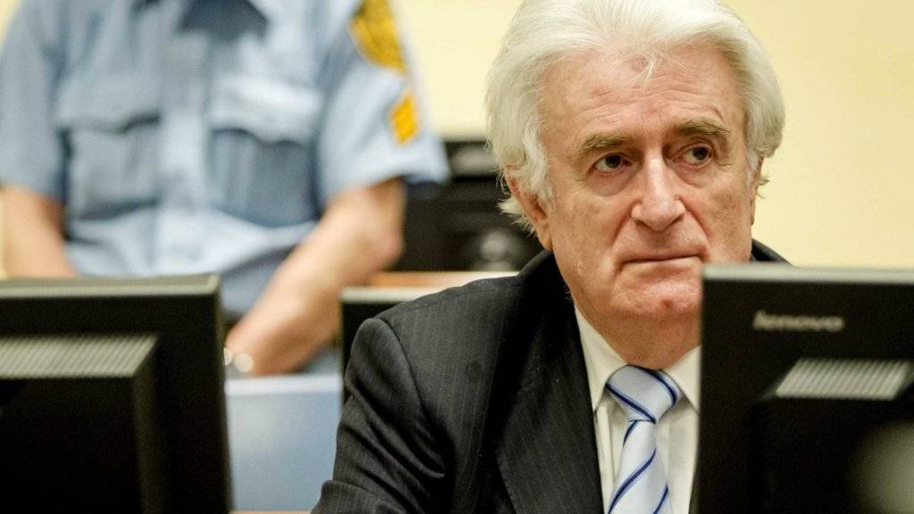 Karadzic bei der Urteilsverkündung im Gerichtssaal. Er will das Urteil anfechten.
