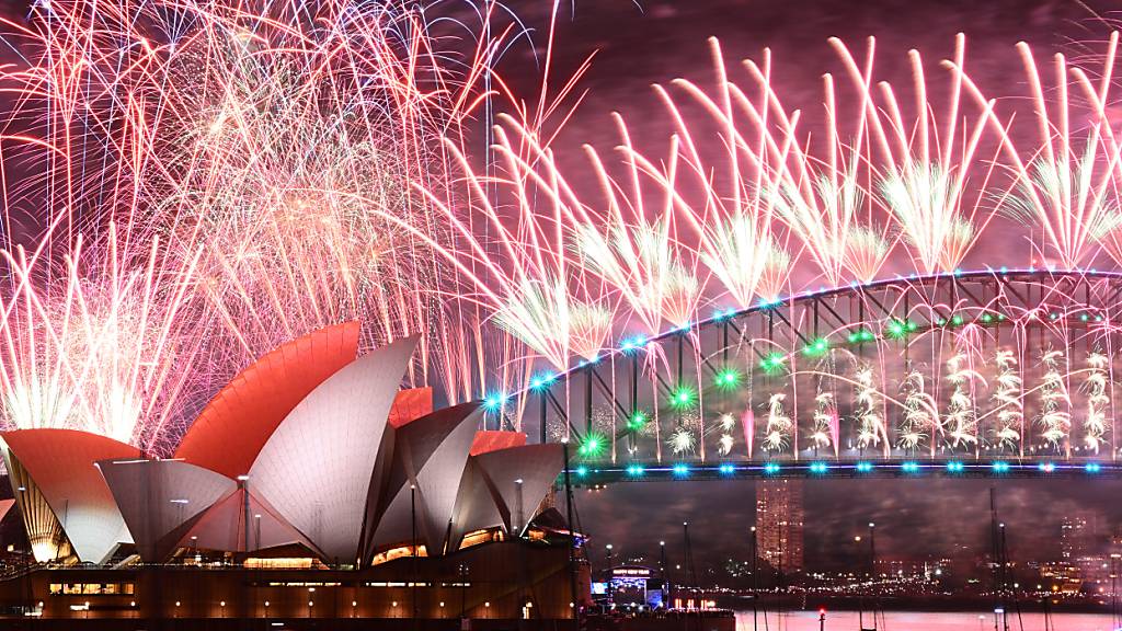 Fireworks are seen over the Sydney Opera House and Harbour Bridge during New Years Eve celebrations in Sydney, Monday, January 1, 2024. (AAP Image/Dan Himbrechts) NO ARCHIVING