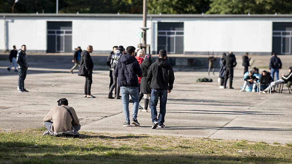 Asylsuchende in der Erstaufnahmeeinrichtung Eisenhüttenstadt in Brandenburg. Foto: Fabian Sommer/dpa