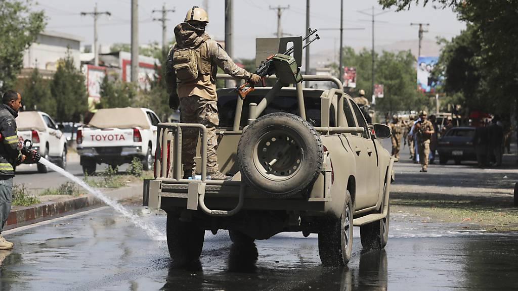 Afghanische Sicherheitskräfte bei der Patrouille. Foto: Rahmat Gul/AP/dpa