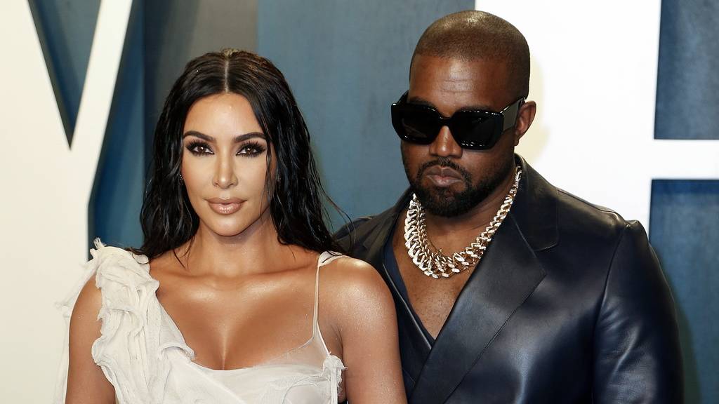 Kanye West (rechts) mit seiner Ehefrau Kim Kardashian.