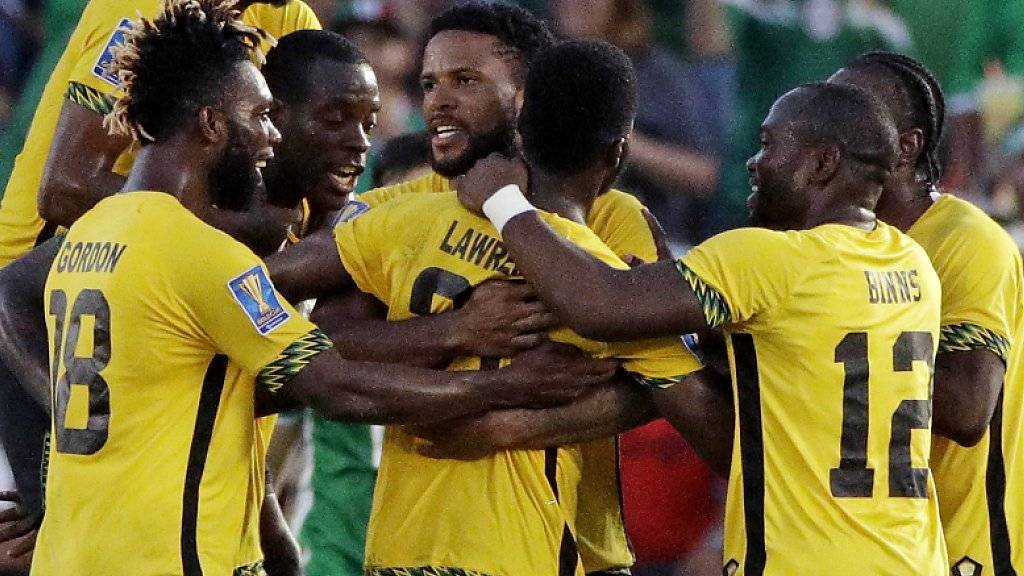 Jamaikas Spieler bejubeln das siegbringende Tor von Kemar Lawrence