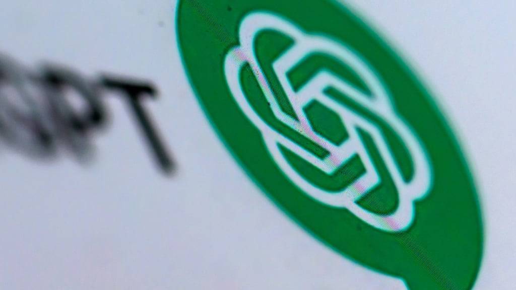 ILLUSTRATION - Das Logo des US-Softwareunternehmens OpenAI ist auf einem Display zu sehen. Das Unternehmen hat den KI-Chatbot ChatGPT entwickelt. Foto: Hendrik Schmidt/dpa