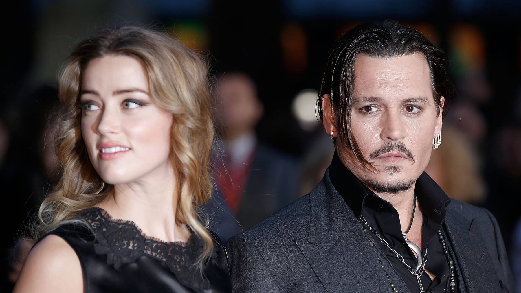 Amber Heard and Johnny Depp attend the «Black Mass» Virgin Atlantic Gala screening during the BFI London Film Festival, at Odeon Leicester Square on October 11, 2015 in London, England.  (Photo by John Phillips/Getty Images for BFI)
