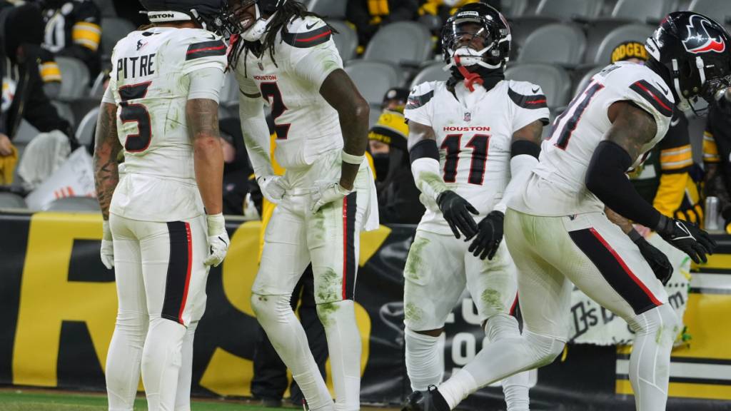 Die Houston Texans bejubeln den ersten Playoff-Auswärtssieg ihrer Vereinsgeschichte