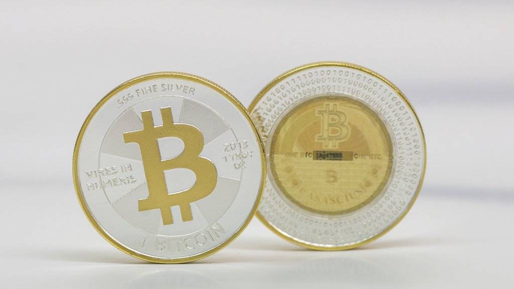 Bitcoin-Börse Bitfinex in Hongkong setzt den Handel aus, nachdem über 100'000 Bitcoins gestohlen wurden. (KEYSTONE/Alexandra Wey)