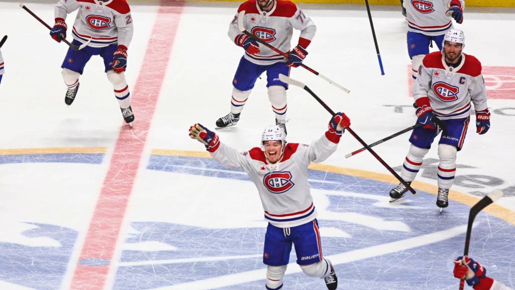 Die Spieler der Canadiens bejubeln den Treffer in der Verlängerung, der sie in den NHL-Halbfinal schickt