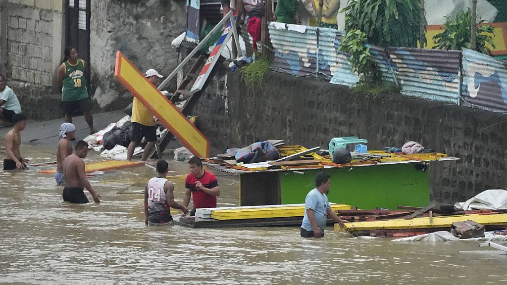 Der Taifun «Doksuri» hat auf den Philippinen heftige Überschwemmungen ausgelöst. Foto: Aaron Favila/AP
