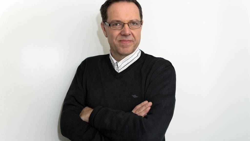 Porträt von Christoph Ammann. SonntagsZeitung Journalist im Ressort Reisen. 19. Dezember 2012. ©Giorgia Müller