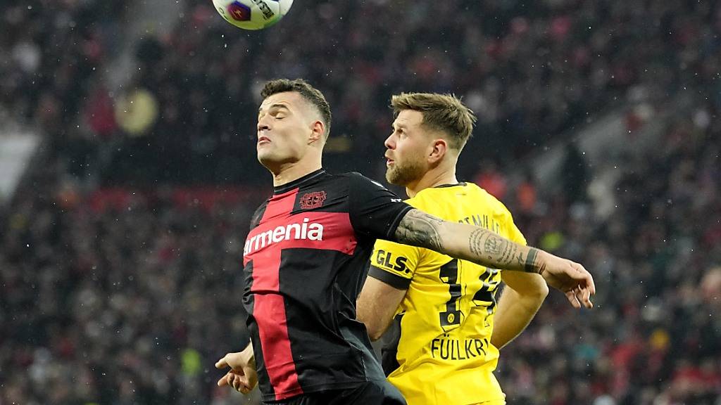 Granit Xhaka (links) ziegte im defensiven Mittelfeld von Bayer Leverkusen eine starke Partie, musste sich gegen Dortmund am Ende aber mit einem Punkt begnügen