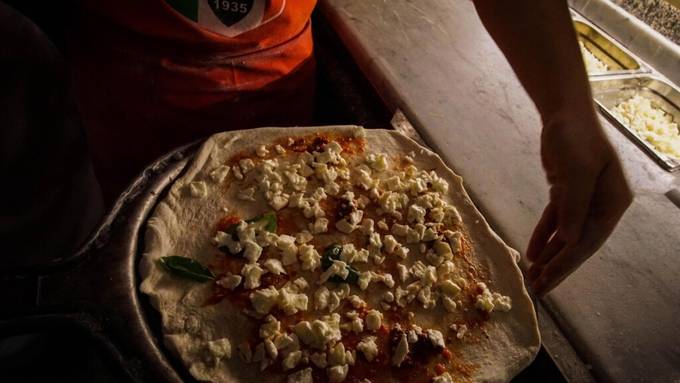 New Yorker will fünf Millionen wegen zu dürftig belegter Pizza