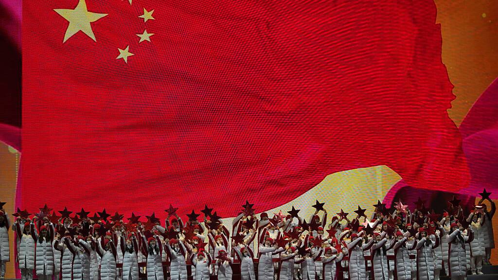 Darsteller während einer Countdown-Veranstaltung in Peking. Foto: Ng Han Guan/AP/dpa
