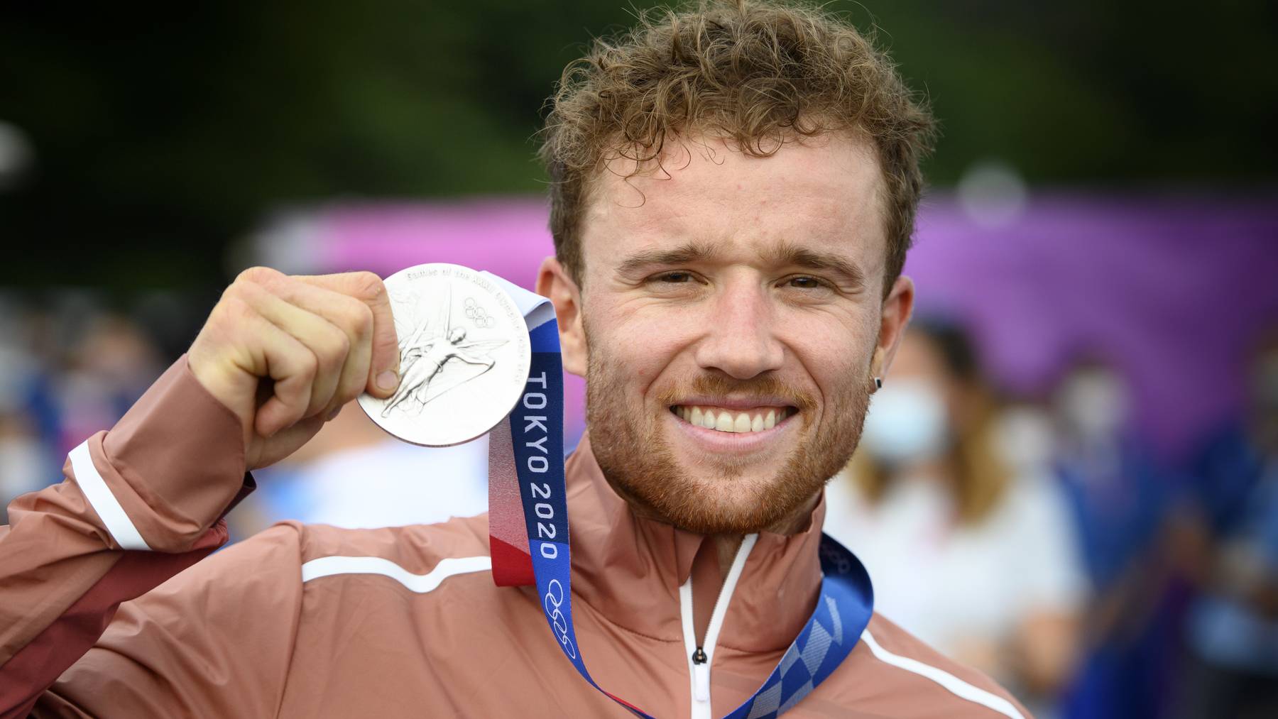Silver medalist Mathias Flueckiger of Switzerland reacts during the medal ceremony for the Men's Cross-Country event of the Mountain Biking events of the Tokyo 2020 Olympic Games at the Izu Mountain Bike Course in Ono, Shizuoka, Japan, 26 July 2021