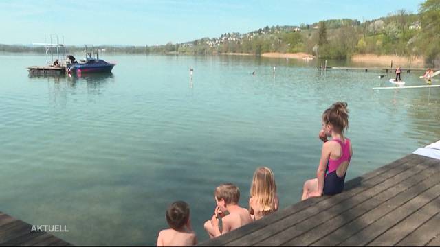 Die erste Wärme lockt in das kalte Wasser