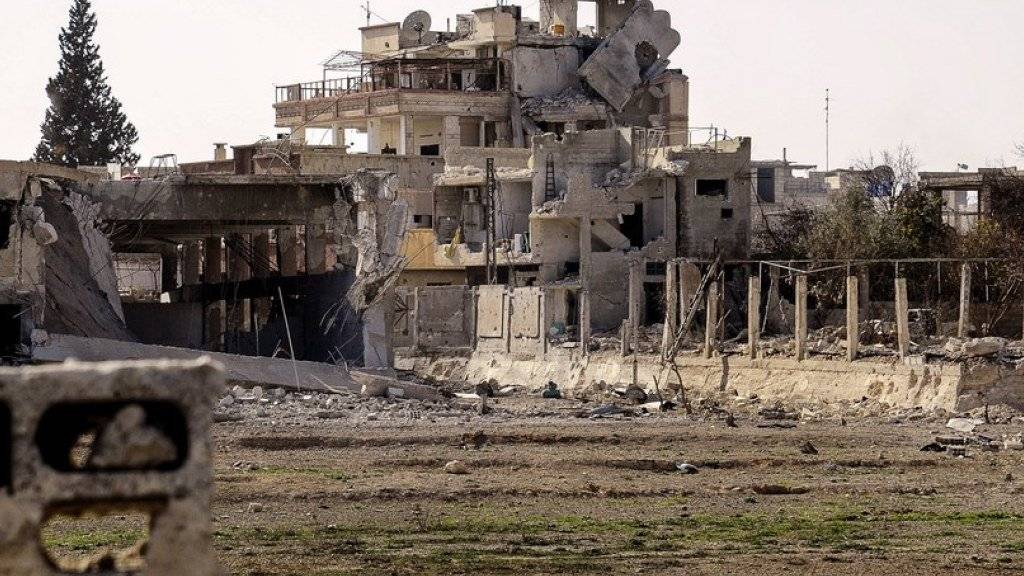 Von Militäraktionen beschädigte Gebäude in der Region Ost-Ghuta, der letzten grösseren Rebellenhochburg nahe der Hauptstadt Damaskus. (Archiv)
