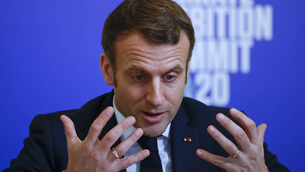 Emmanuel Macron, Präsident von Frankreich, spricht bei einer Videokonferenz anlässlich des fünften Jahrestages des Pariser Klimaabkommen. Foto: Yoan Valat/EPA POOL/AP/dpa