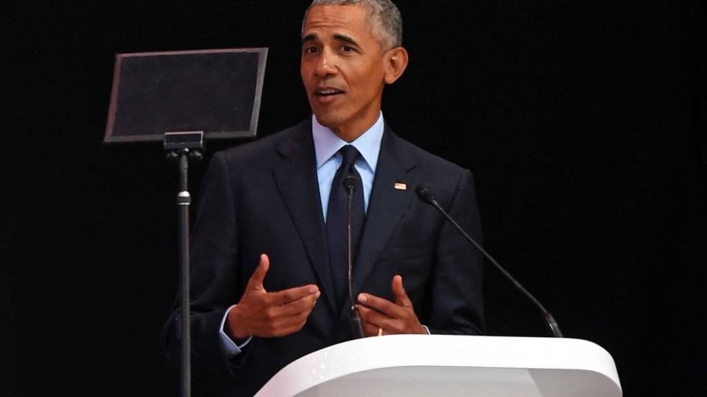 Der ehemalige US-Präsident Barack Obama ruft in Johannesburg zur Fortsetzung von Nerlson Mandelas Kampf gegen die Diskriminierung auf.