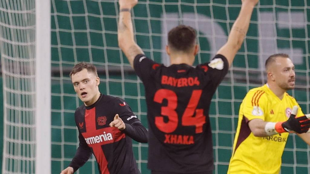 Granit Xhaka jubelt nach dem Treffer von Florian Wirtz und über einen nie gefährdeten Sieg gegen Düsseldorf, der Leverkusen in den deutschen Cupfinal bringt