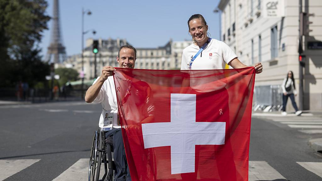 Eröffnungsfeier mit Hug und Kratter als Schweizer Fahnenträger