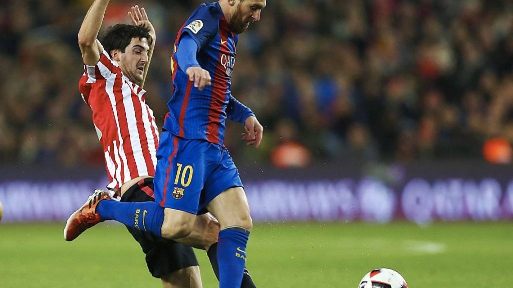 Bilbaos Mikel San Jose (links) kann Barcelonas Lionel Messi nicht stoppen