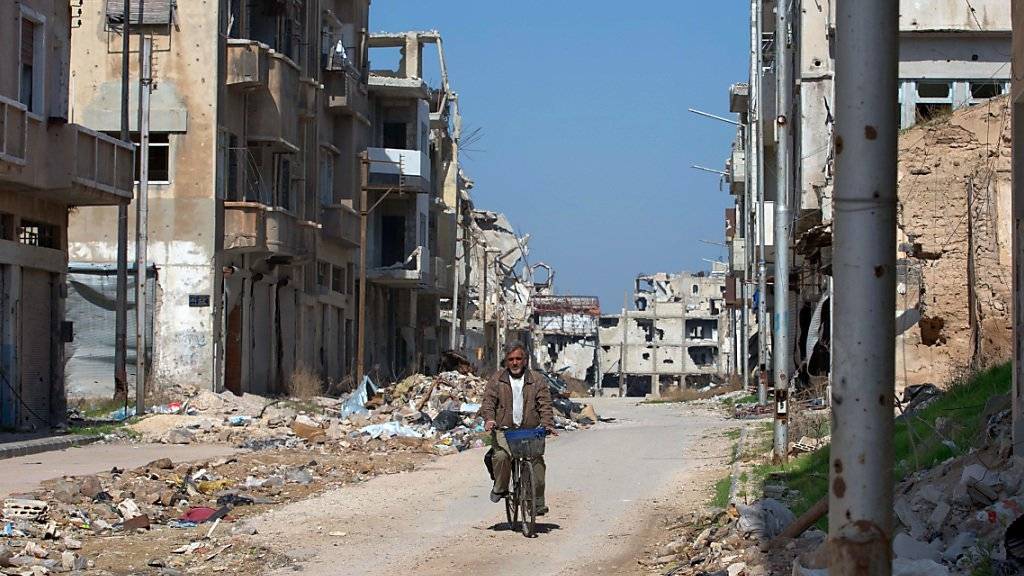 Für viele syrische Städte kommen Friedensverhandlungen zu spät - wie für die westsyrische Grossstadt Homs, wo das Zentrum vollkommen zerstört ist (Aufnahme vom 26. Februar dieses Jahres).